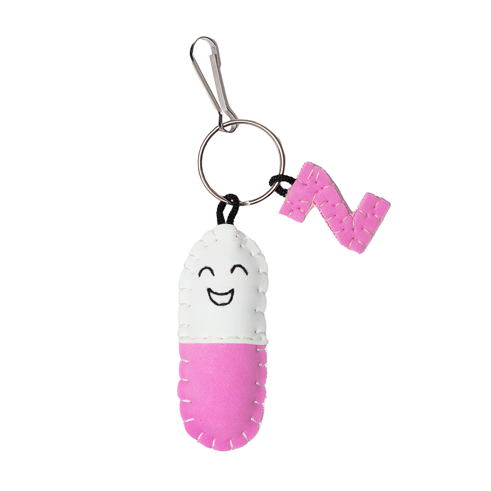 ميدالية مفاتيح شكل كبسولة ضاحكة